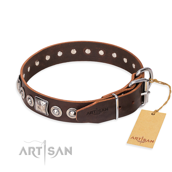 Genuine leather dog collar made of reliable material with strong decorations